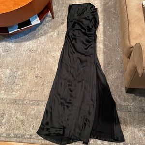 Black sleeveless Gucci gown.